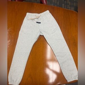 Unisex FEAR OF GOD ESSENTIALS heather grey sweatpants - size Small